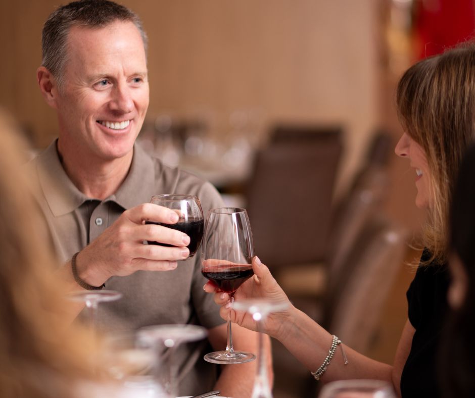 People clinking drinks