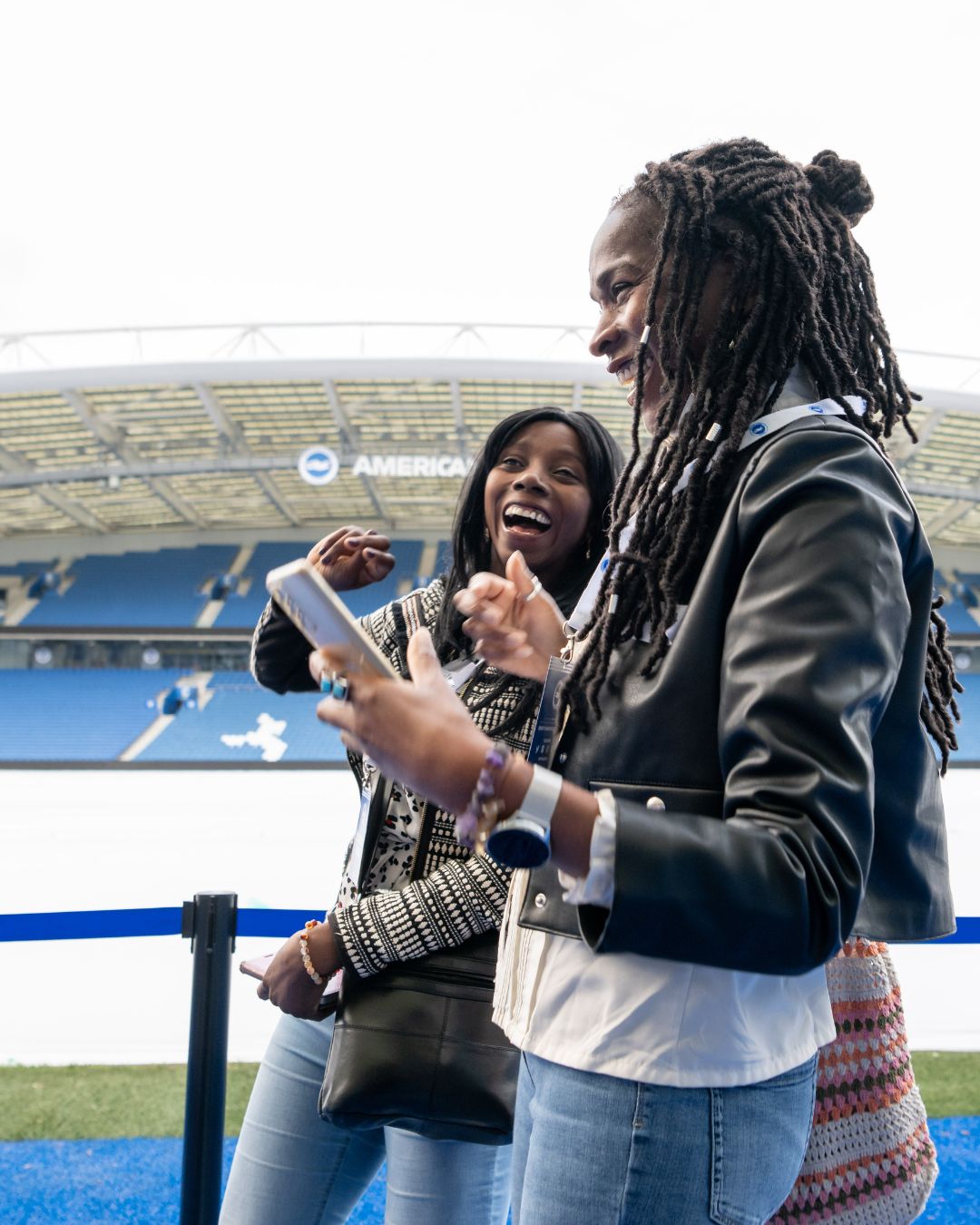 People walking through stadium